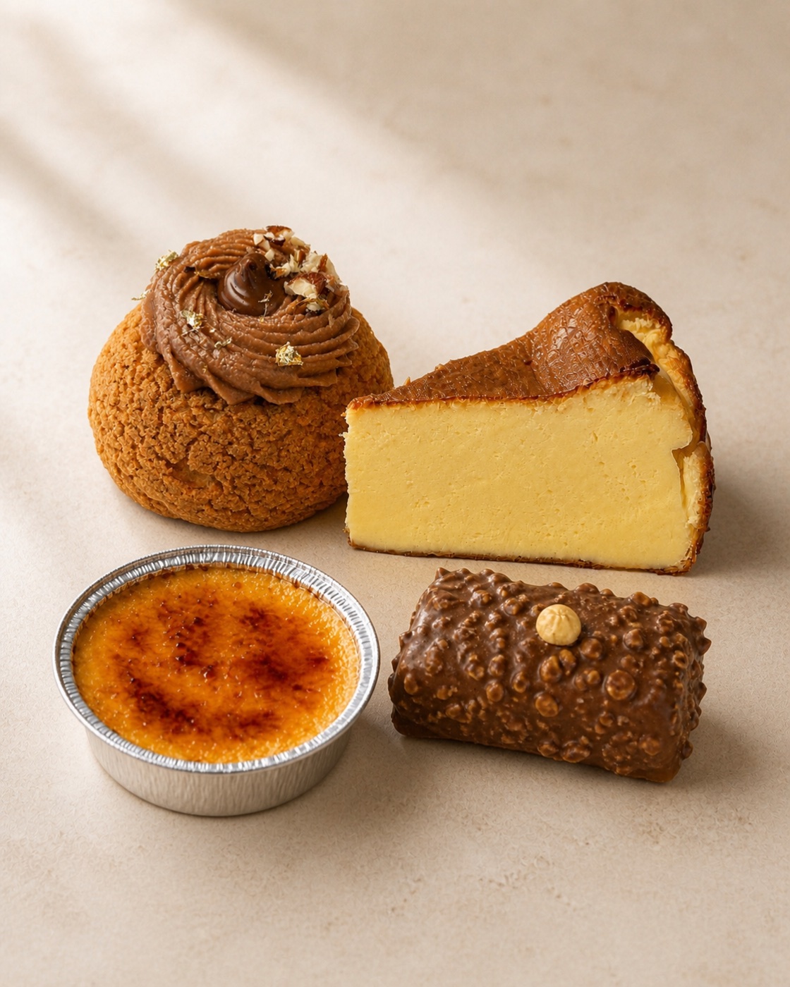 Cake Compound choux, crème brûlée, chocolate hazelnut slice and Basque burnt cheesecake